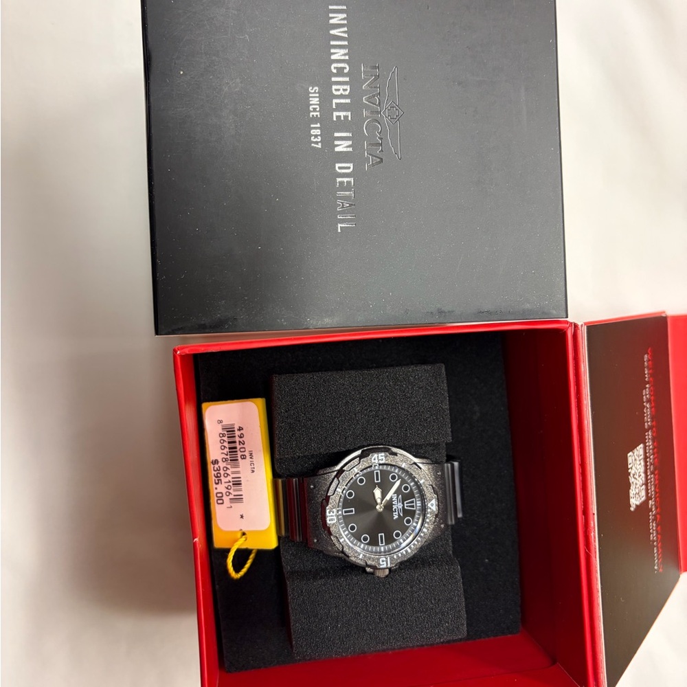 Invicta Black and Silver Timepiece